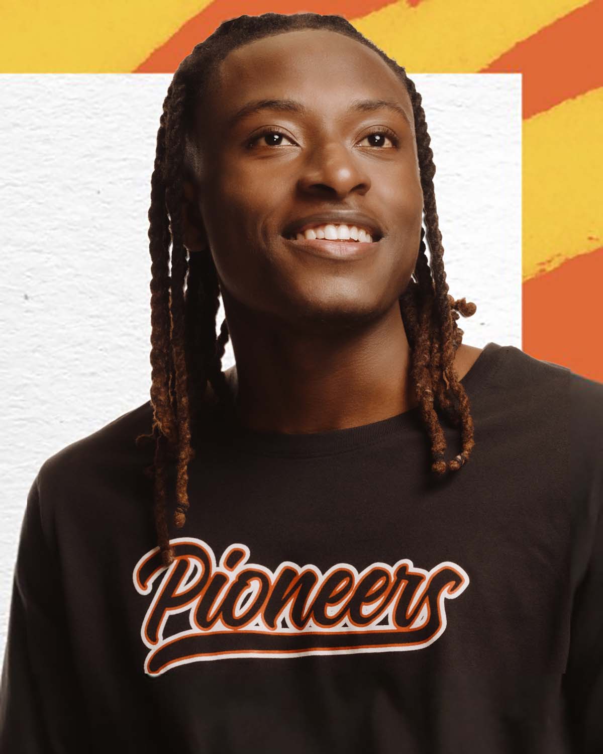 Smiling William Paterson student wearing a Pioneers shirt